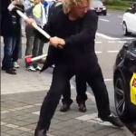 Protester smashes BMW