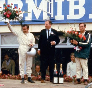 Bruce McLaren (left) Henry Ford II and Chris Amon celebrate the 1966 win