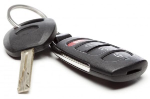 set-of-car-keys-against-white-background