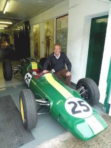 Clive Chapman with Lotus 25, the car Jim Clark raced in the NZ Grand Prix in 1968