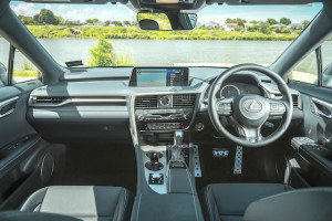 IMAGE - RX 350h F Sport interior dash shot overlooking the water and banks