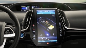 The iPad-like instrument panel in the Prius Prime is similar to that in the Tesla S.